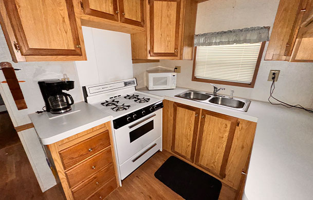 Casa Villa park model kitchen at Adventure Bound Southwoods